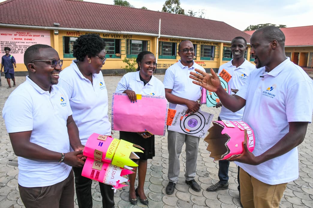 Kenyan teachers collaborating on practical classroom approaches