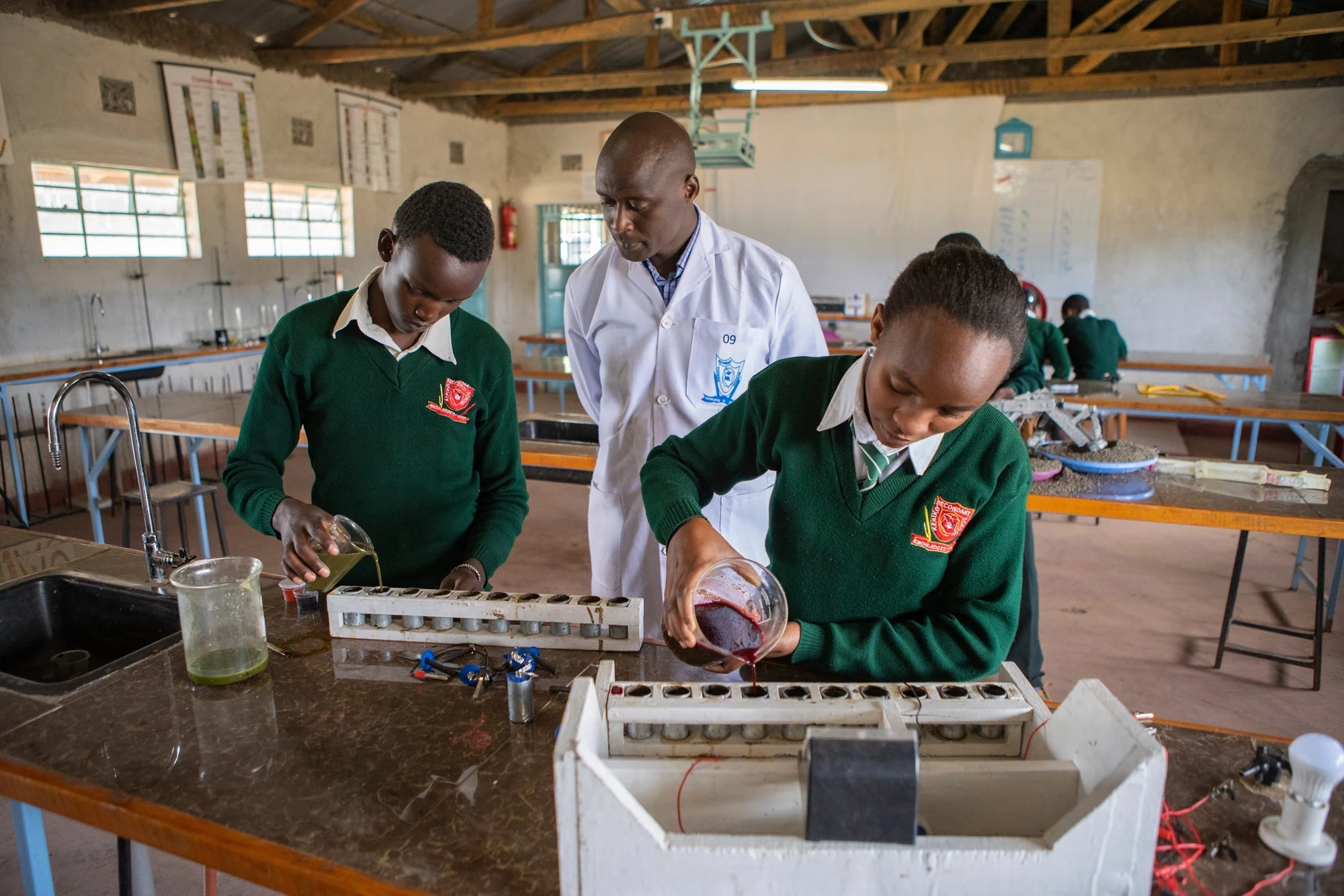 Peter Tabichi engaging with students in classroom