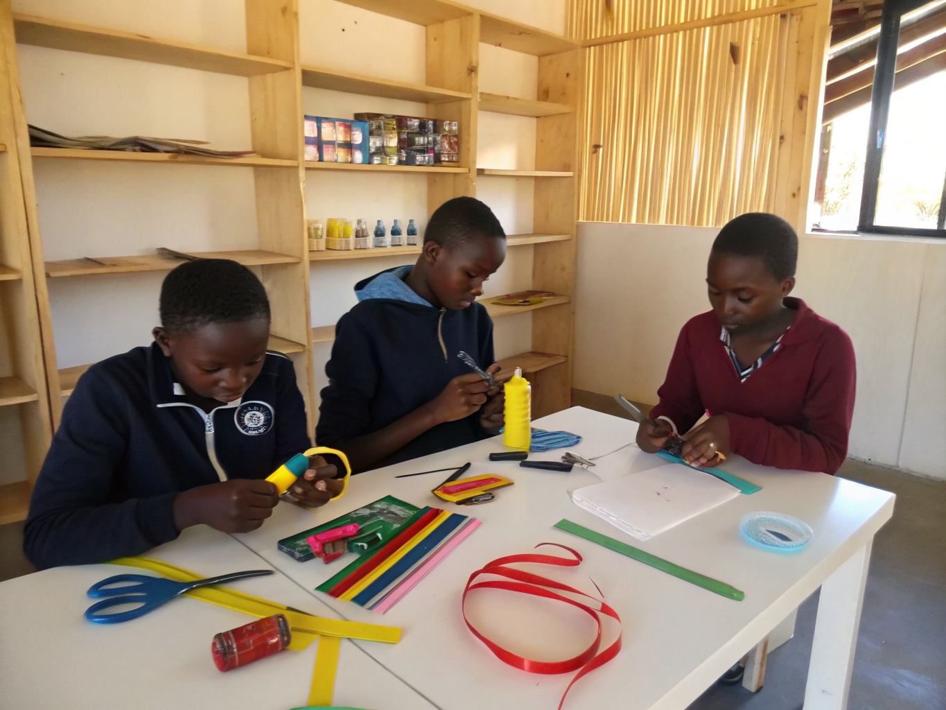 Kenyan educators collaborating on practical hands-on classroom practices and peer-led testing